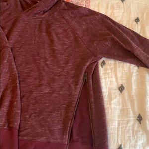 Lululemon hoodie with side vent zippers.